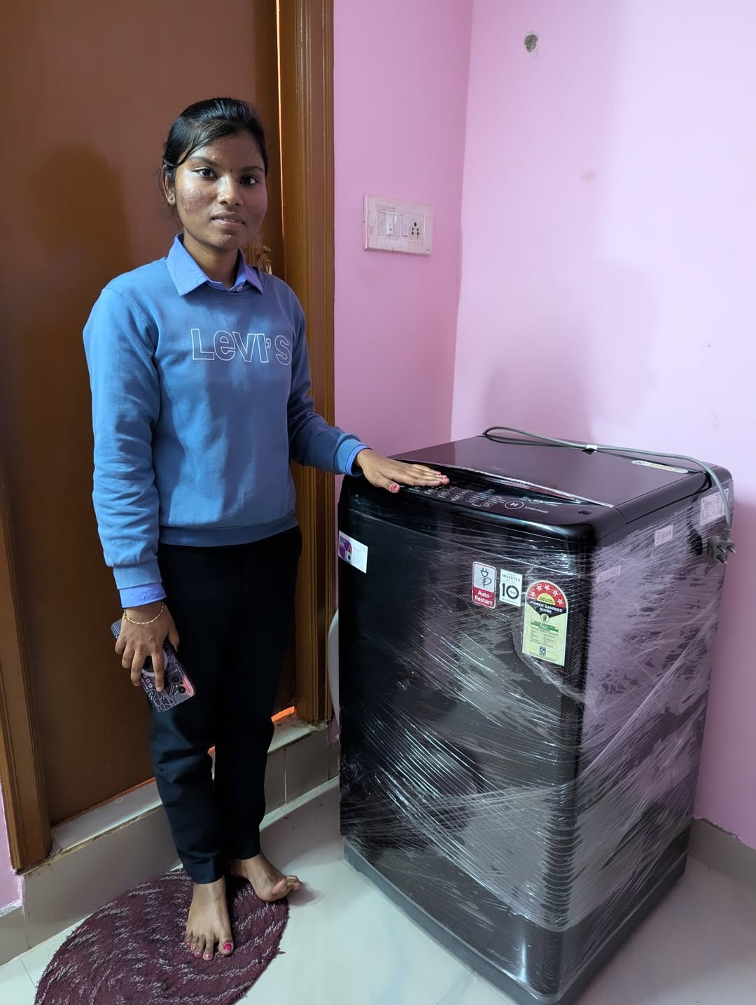 Happy customer with refurbished washing machine